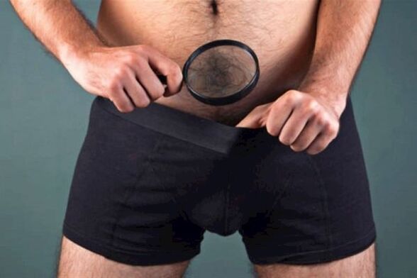 A man used a magnifying glass to examine his penis and wanted to make it thicker